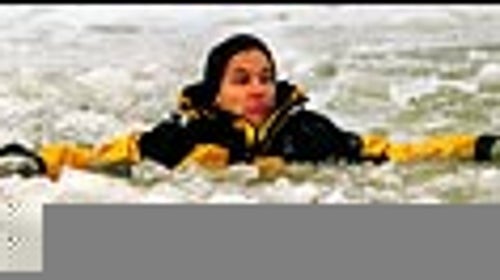 Committed to the core: the Ph.D who always wanted to be a stuntman takes another icy plunge for science near Winnipeg, Manitoba.