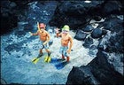 Clyde and Mason on a backyard snorkeling expedition near Puako