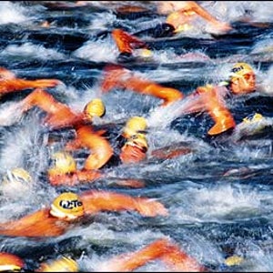 Wet work: Racers swimming Lake Almaden during the San Jose International Triathlon