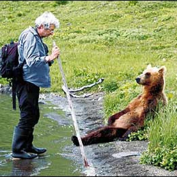 Bear Whisperer: Russel with Biscuit, an orphaned bear he raised in Kamchatka