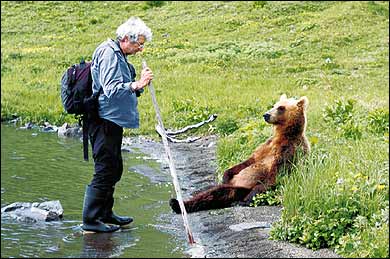 Bear Whisperer: Russel with Biscuit, an orphaned bear he raised in Kamchatka