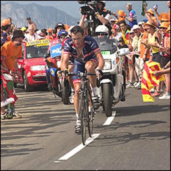 Armstrong narrowly bested Ivan Basso for a Stage 13 victory