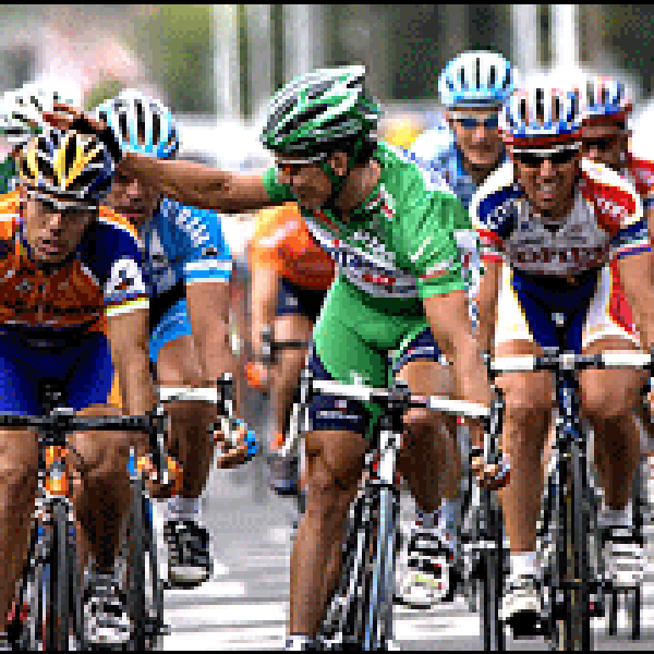 Robbie McEwen pats Oscar Freire on the shoulder after Freire's Stage 9 win.