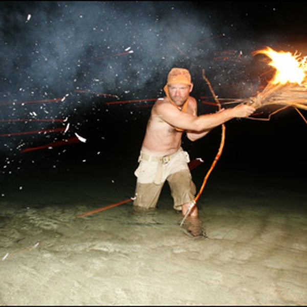 Stroud spearfishes by torchlight.