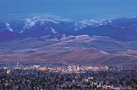 Missoula city lights beneath the high peaks of the Rattlesnake Wilderness