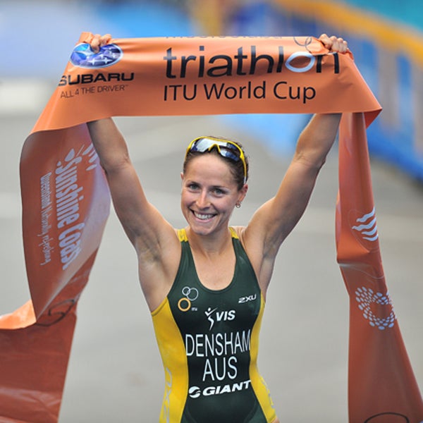 Erin Densham celebrates after winning the Mooloolaba Triathlon, March 25, 2012