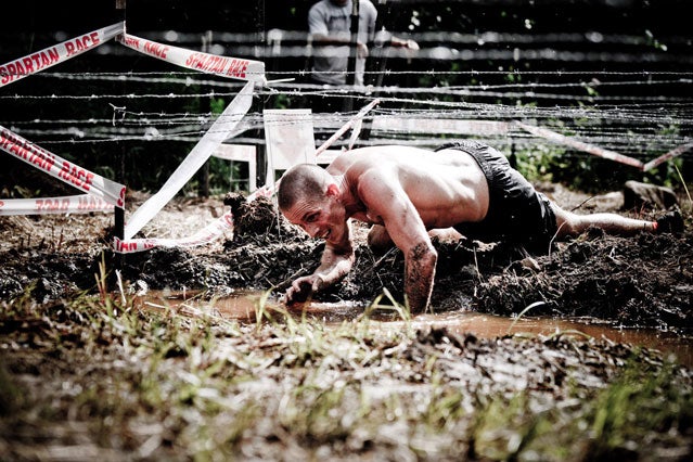 Spartan Race hobie call mud pit barbed wire racing running