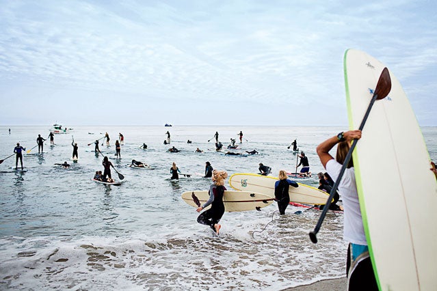 NRDC Peace Paddle Out america beach ocean water california surf surfing surfer paddle paddle out sports sport surfboard surf board Malibu NRDC Natural Resources Defense Counc