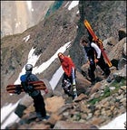 DaKine Blade back pack, the Arbor S-Series snowboard, the K2 Eclipse boot (his), the the Atomic Beta Ride 10,50 Carbon ski boot (hers), and Salomon's Crossmax 9 Pilot (hers)