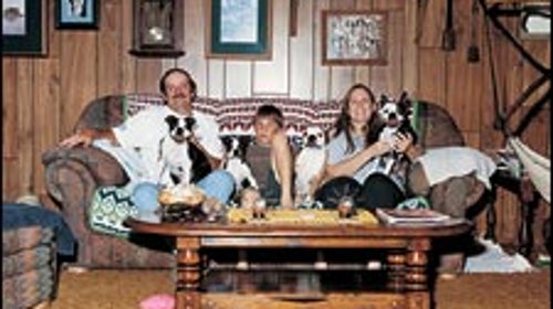 Pause, then play: from left, Dave, Roger, and Terrie Carver, with Black Jack, Longtail, Bubba, and Wilma