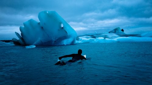 Cold weather surfing arctic surfing surfing photography Iceland Burkard OutsideOnline