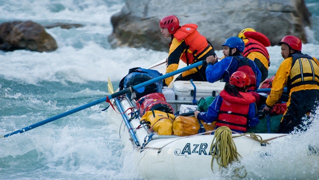 Last Descents guide Travis Winn navigates turbulent waters.