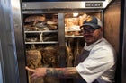 Sean Brock with curing meats.