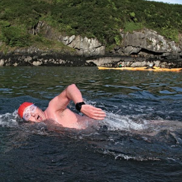 Swimmer Jim O'Connor lapping Sandycove; Ned Denison calls the waters here