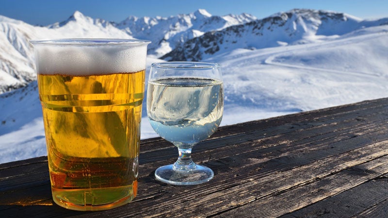 two glasses with beer and white wine