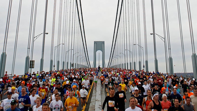 Runners cross the Verrazano Narrows Bridge at the start of the ING New York City Marathon.