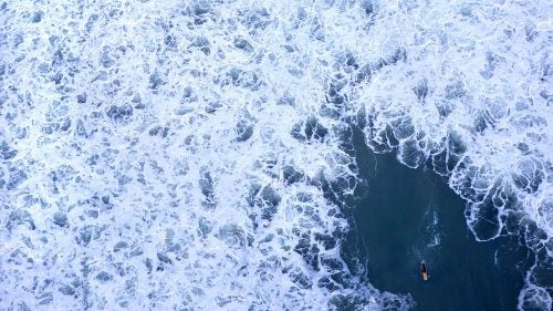 Drones have allowed just about anyone to gain an aerial perspective. Donald Miralle’s images show you why these unmanned aircraft might change photography forever—and why a helicopter is still pretty handy, too. Photo: A surfer in whitewater during a large swell at Swamis Beach.