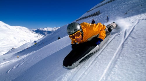 You should definitely wear a helmet. And bring a shovel, an avalanche beacon, and a pair of snowshoes. Use a high-performance sled, one that’s light enough to haul to the summit and robust enough to handle steeps and drops. You’ll want a method of self-arrest in the event you part with your ride. Mt. Massive and Mt. Elbert are good options because of their low grades. Throw in an extra granola bar. This could be a workout.