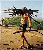 Wilson gathers firewood