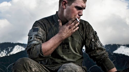 Adam Ferguson Afghan Afghanistan Asia Central Asia Joseph Moody Korengal Kunar South Asia South Central Asia Spc. Taliban U.S. US VII Valley adult anti-coalition army cigarette conflict destruction exterior hill hills insurgents male man men military mountain mountains outdoors outside portrait smoke smoking soldier soldiers specialist terrain troops violence war Adam Ferguson
