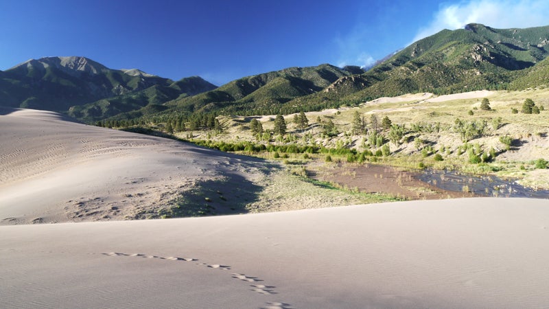 medano fire great sand dunes national park national park colorado san luis valley slv great sand dunes sand dunes dunes outside magazine outside online cheap land escapes the go list will grant