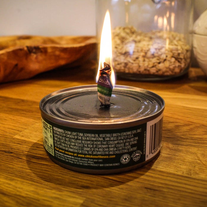 In case of a mass power outage, you’ll need to illuminate your surroundings. If the flashlight batteries are dead, a can of tuna can provide hours of light. Stab a small hole in the top of an oil-packed tuna can, then roll a two-by-five inch piece of newspaper into a wick. Shove the wick into the hole, leaving a half-inch exposed. Wait a moment for the oil to soak to the top of the wick, then light with matches. "Your new oil lamp will burn for almost two hours," Stewart says, "and the tuna will still be good to eat afterward."