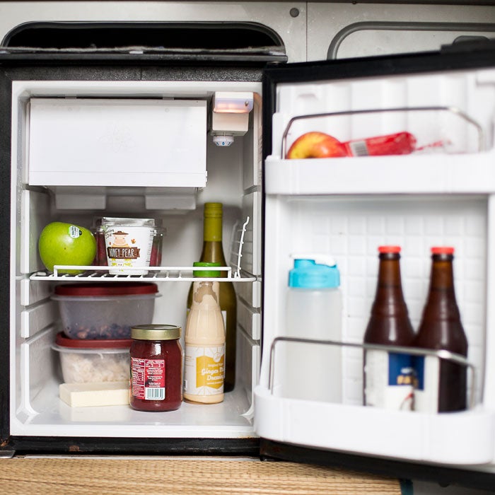 Pro tip: Store a quart-size Ziploc full of frozen water in the back of the freezer to make your fridge stay colder and conserve charge.