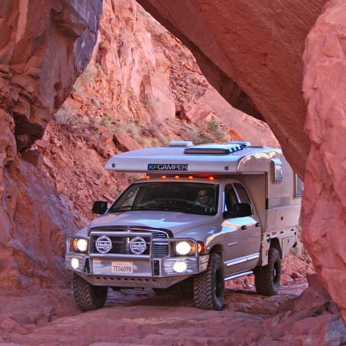 This pop-up truck-bed camper (from $33,000 to $75,000) is designed for backcountry adventures. With the push of a button, the top electronically expands in less than a minute. The seamless monocoque shell, light and strong, is made from a fiberglass-reinforced carbon-fiber sandwich over closed-cell foam.
That construction makes this camper warmer and quieter than its competitors, but it’s still ready for rough terrain. Unlike traditional campers, there’s no wood, staples, caulk, or chopped-fiberglass insulation to fail during off-road jostling.