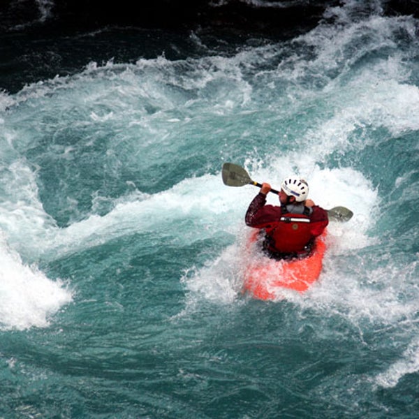 kayak boat extreme sport river rapids danger fun excitement recreation paddle whitewater waves spray mist adventure person man