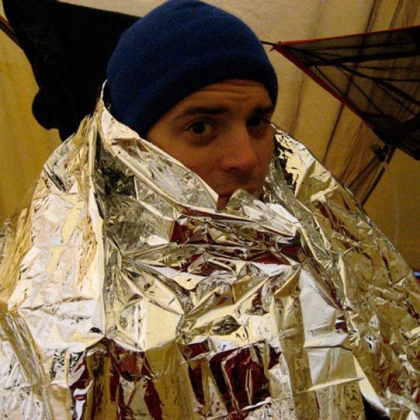 Camping with emergency blanket