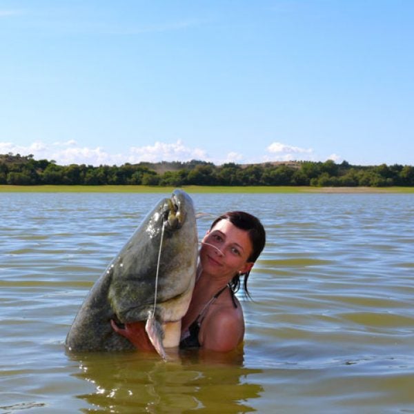Woman with catfish