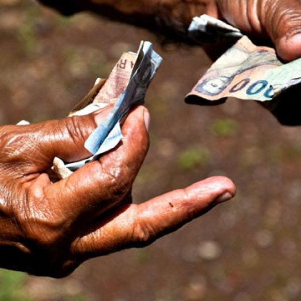 Asia Bali Indonesia Island Money change hands tipping