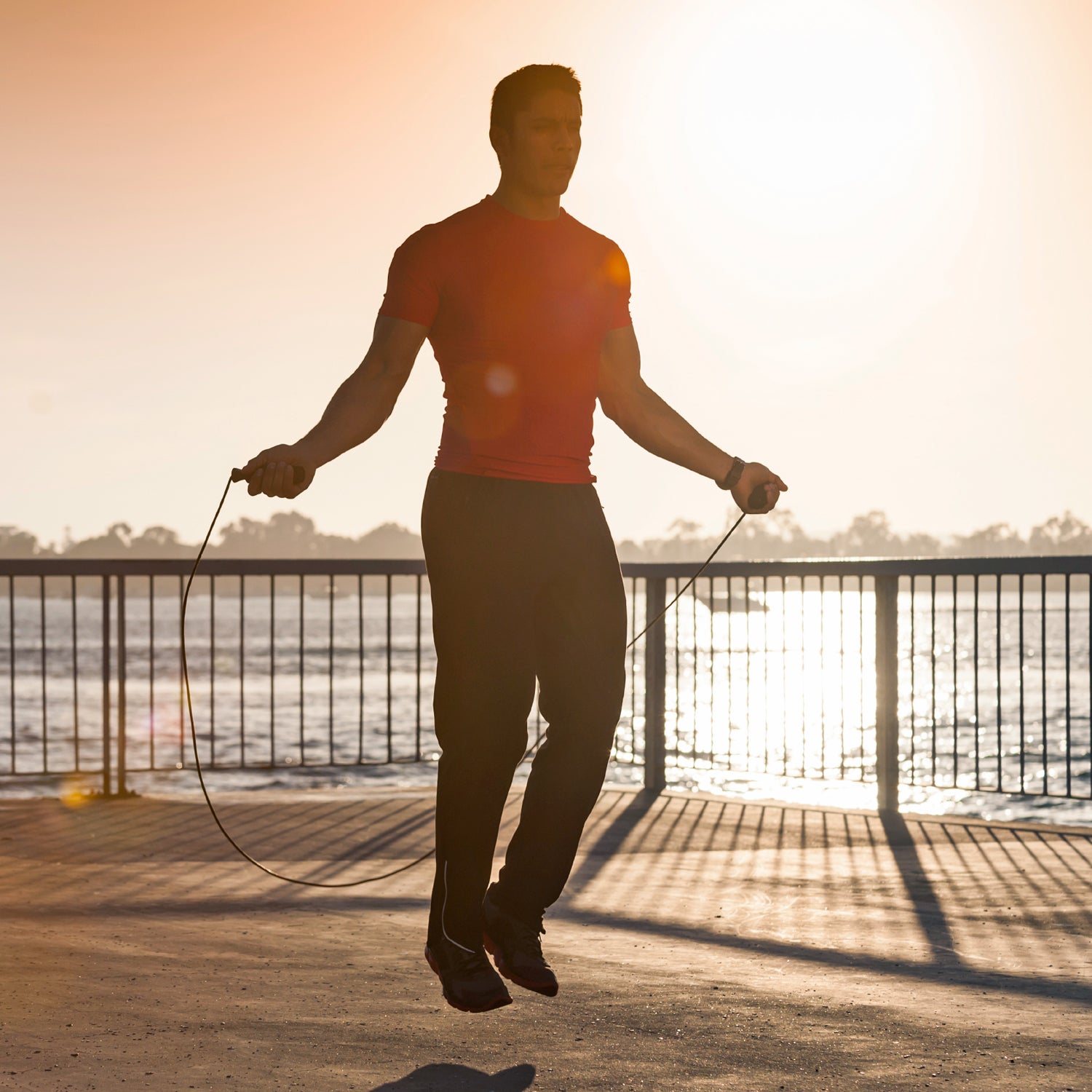 20s Athlete Back Lit Bright Challenge Competition Competitive Sport Concepts Concepts And Ideas Determination Exercising Human Muscle Jump Rope Jumping Rope Men Mid Adult Motivation Muscular Build One Person Silhouette Sport Sports And Fitness Sports Training Strength hispanic ocean sun flare outside outside magazine outside online palpitations irregular heartbeat fitness coach body work erin beresini a fib extrasystole