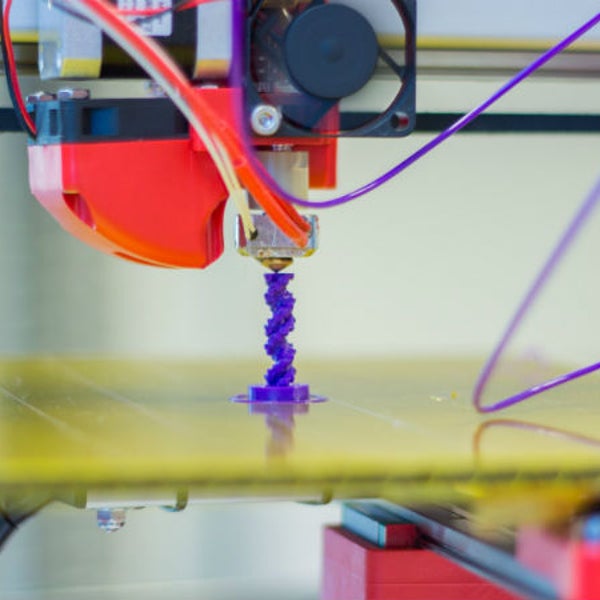 A photo of the printing head of a FELIX 3D Printer in action. The Mobile Fab printer is much smaller and more accessible.