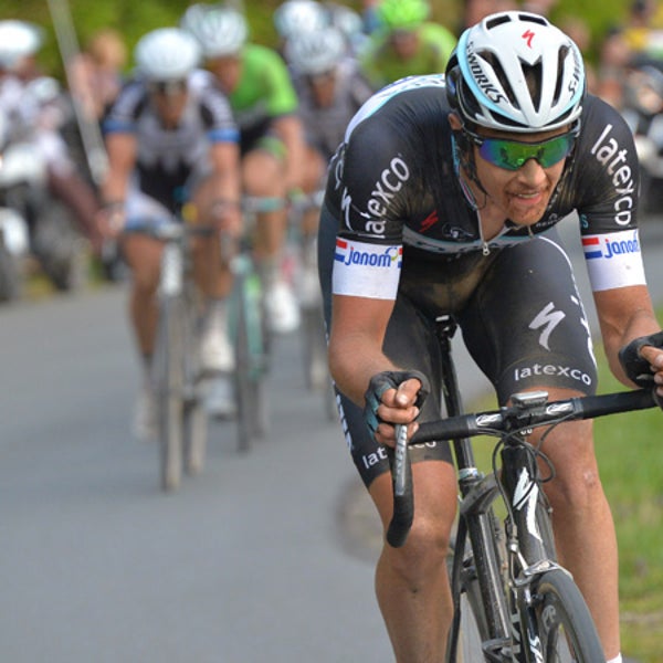 Omega Pharma team cyclist Niki Terpstra of the Netherlands in action to win the 112th edition of the Paris-Roubaix cycling classic, a 257 kilometer (159.69 mile) one day race, of which 51.1 kilometers (31.7 miles) are run on cobblestones, at the velodrome in Roubaix, northern France, on Sunday, April 13, 2014. Germany's John Degenkolb of the team Giant came second and Fabian Cancellara of the Trek Factory team took third. (AP Photo/Bernard Papon, Pool)