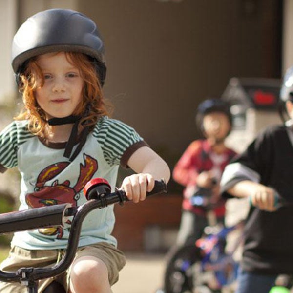 Who wants to learn to ride a bike in the driveway when you can do it alongside the Seine?