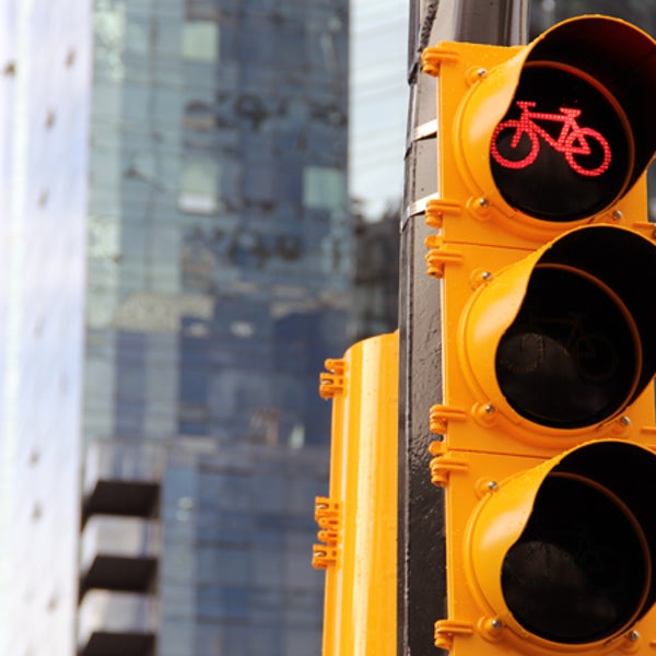 Local laws give potential safer bike plans the red light.