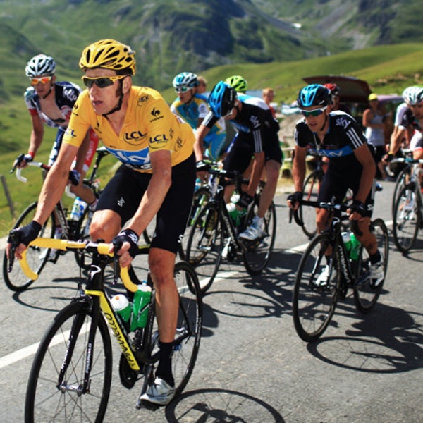 Bradley Wiggins rides in the 2012 Tour de France, where he took first place.