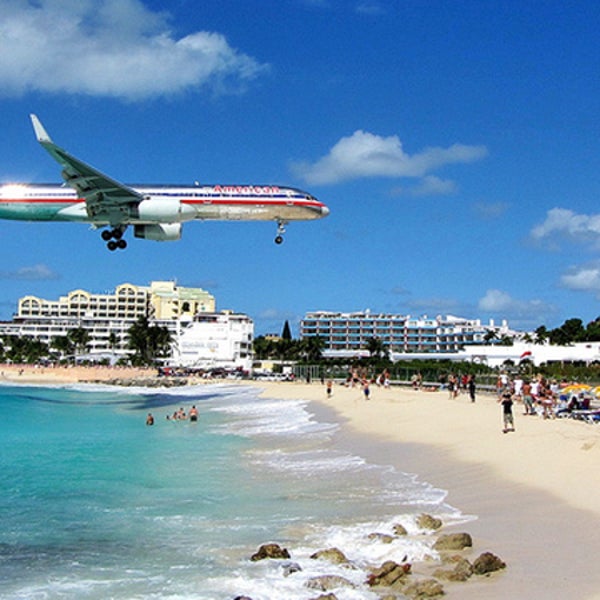 St. Maarten American Airlines booking fees listing fees Orbitz cheapflights.com ebookers.com news from the field outside online outside magazine outside airplane air travel travel agency airline website