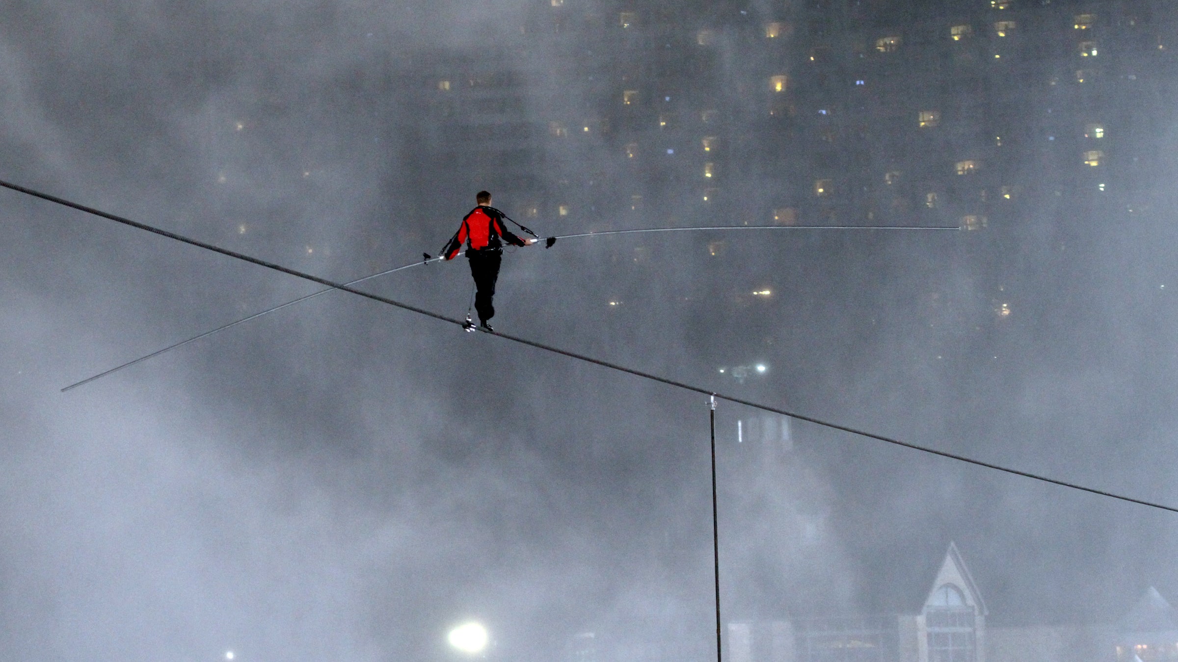 Nik Wallenda walked two wires strung 50 feet above Chicago in November 2014.