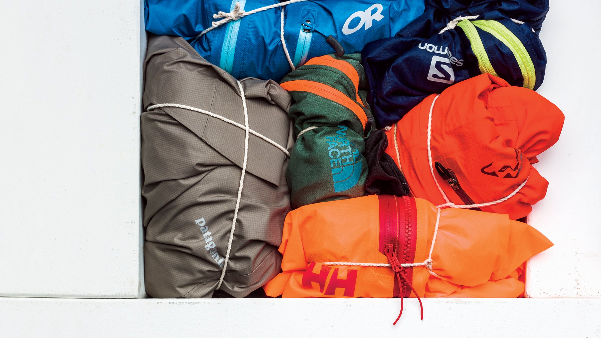 Outdoor Research Helium II Salomon Fast Wing Hoodie Dynafit Trail DST Helly Hansen Odin Minimalist Patagonia Storm Racer and The North Face BTN