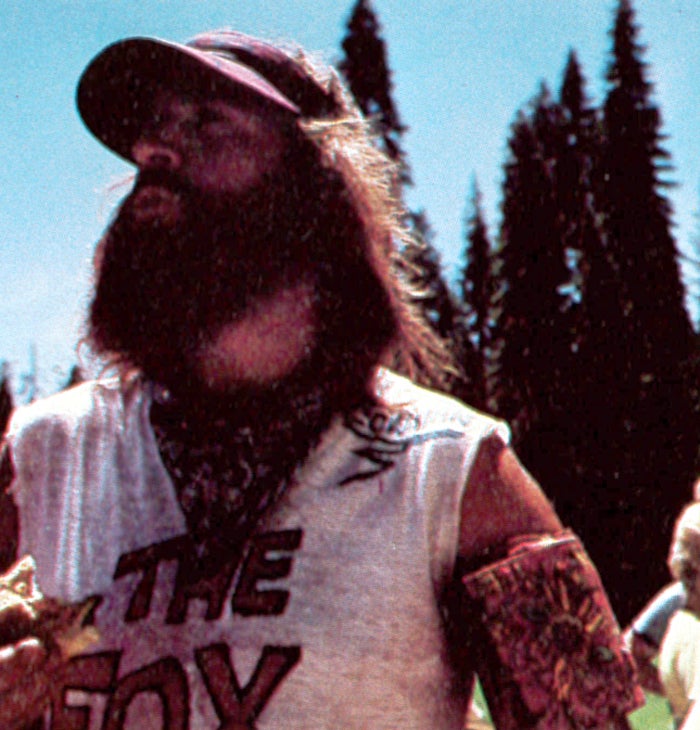 Well-known marathoner Ken "Cowman" Shirk has his blood pressure measured at the Robinson Flat checkpoint.