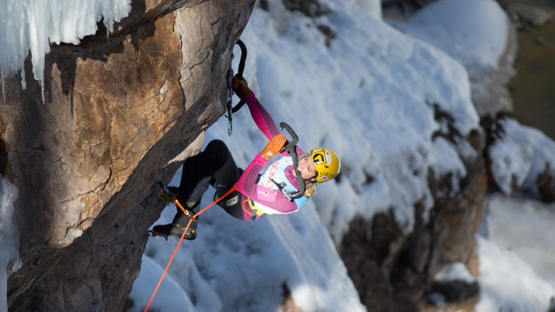 Women's overall winner Angelika Rainer takes a break on the wall.
