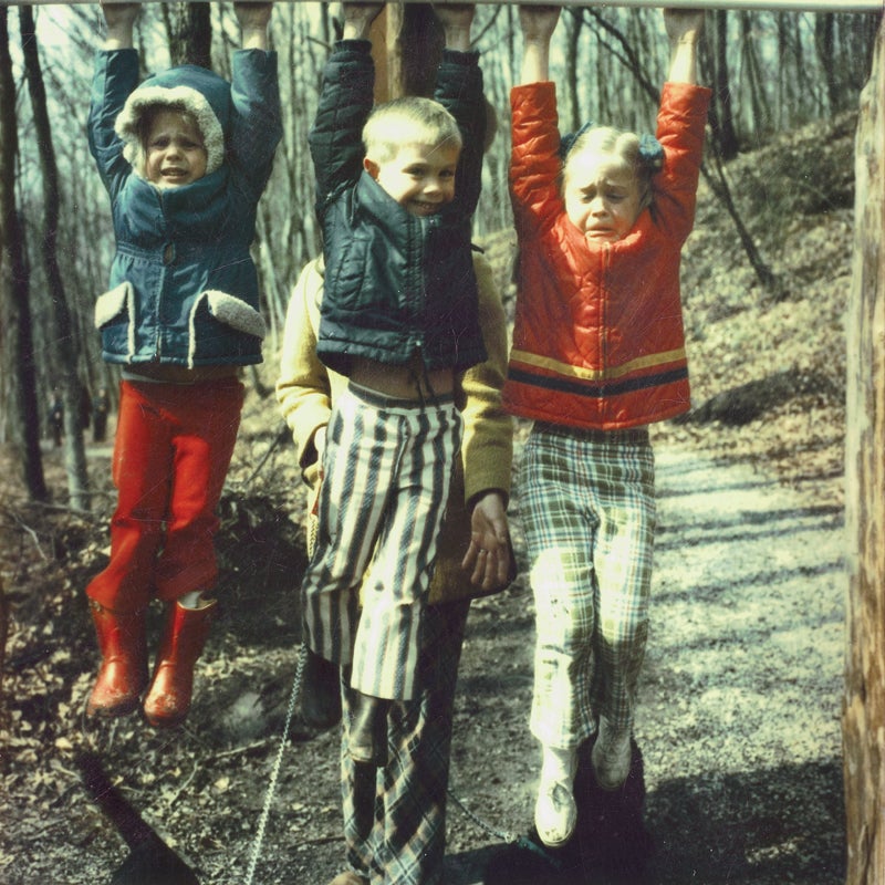 Christopher Solomon and his sisters.