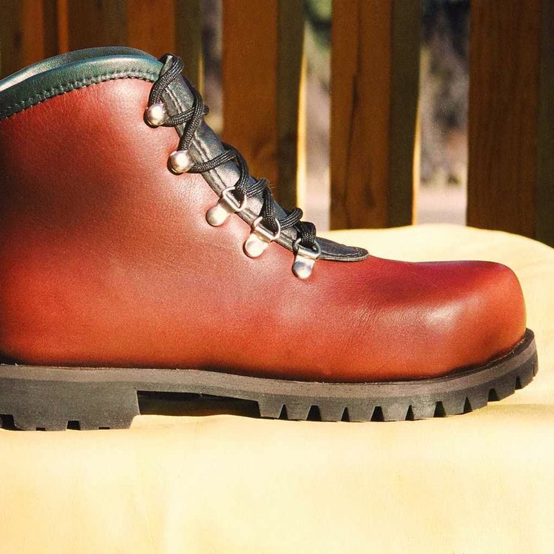 Boots Produced Per Year: 36 to 40
John Calden came of age in San Francisco during the 1960s. He studied criminology at a local trade school and took a leather craft class because he thought it would be an easy A. He ended up falling in love with the topic, and ditched his original career plan to work at Mountain Traders after graduation before escaping to the Rocky Mountains. In 1978, he opened his namesake shop.
He begins his creations with a piece of tracing paper, a pencil, and the buyer’s foot to sketch out the foot’s outline. Then he uses measuring tape to find the circumference of the foot. Together, those two figures create the perfect fit that the boot is then molded around.
Calden’s boots are built to last. One of his first customers worked as a park ranger in Yellowstone when he bought his pair in 1978. That man still tromps around the mountains in his original pair: the only alternation Calden has made is to replace the soles. Though Calden focuses on function, he also knows fashion matters. “You have to make them as pretty as possible to charge $1,000 or so,” he says.
From $1,000, johncaldenboots.com